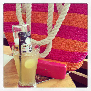 pink and orange straw bag