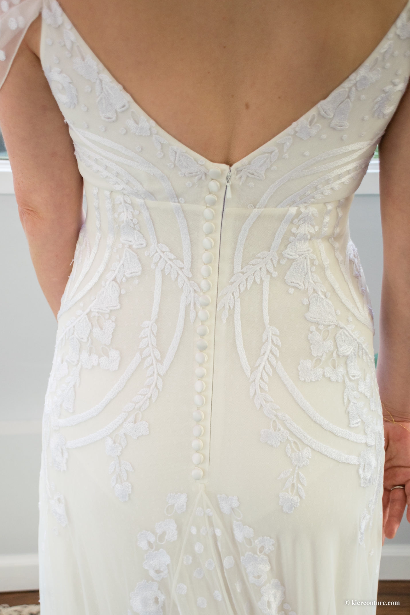 back of wedding gown with buttons