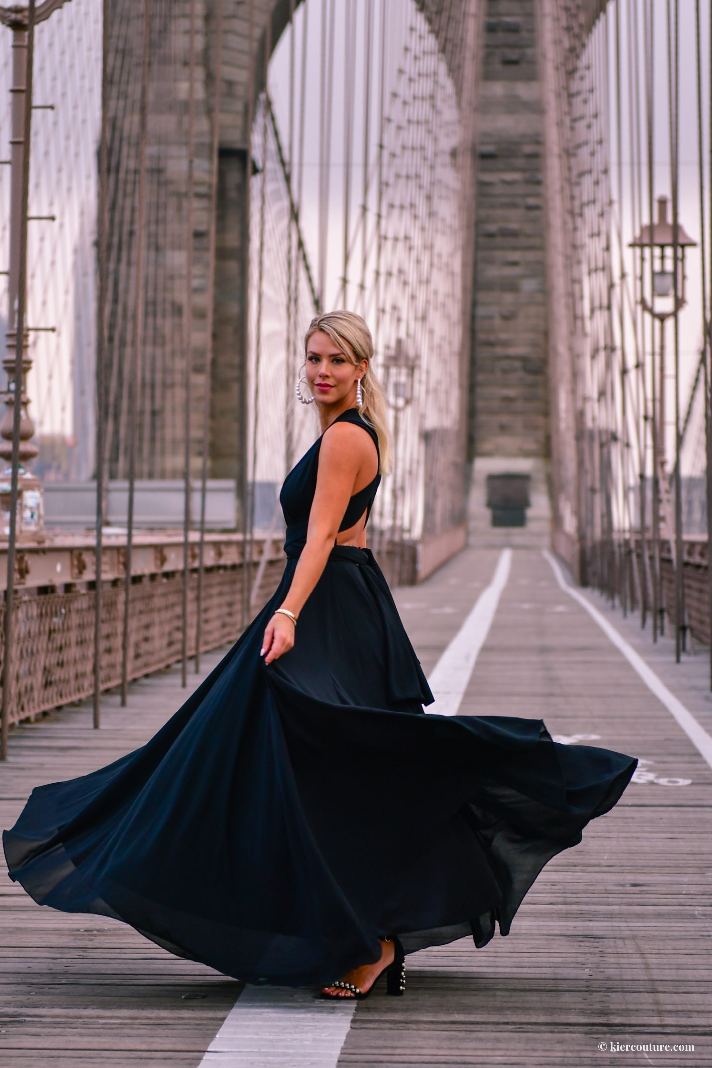 black ballgown on brooklyn bridge