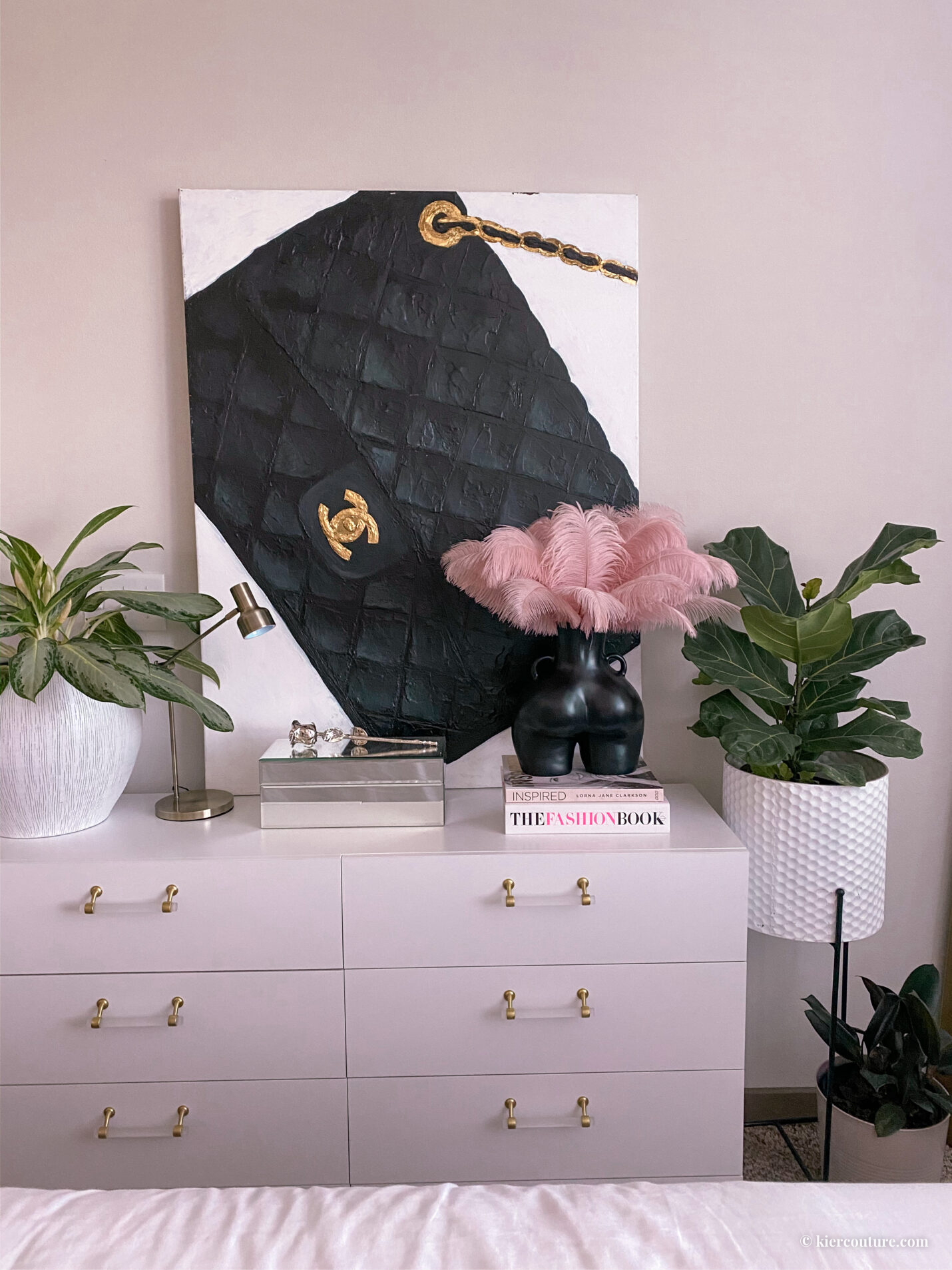 Chanel painting, butt vase, pink ostrich feather bouquet